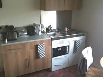 Photo 1: Compact Kitchen