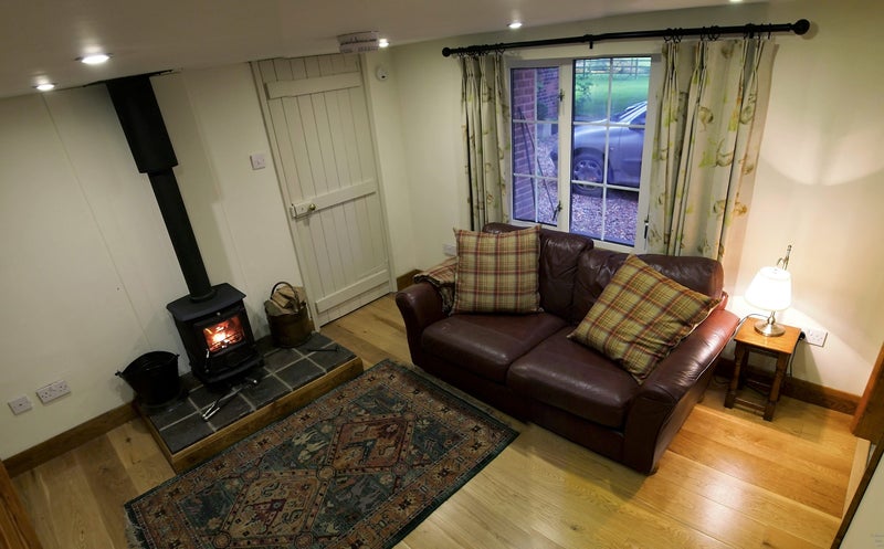 Photo 1: Lounge with cosy log burner