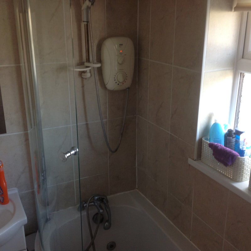 Photo 1: Shared bathroom