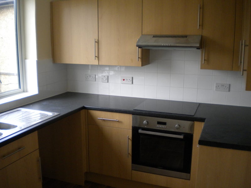 Photo 1: Kitchen