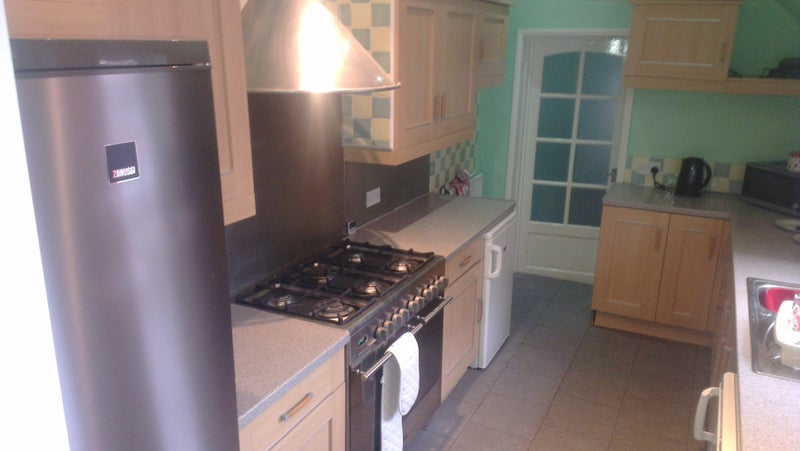 Photo 1: Kitchen
