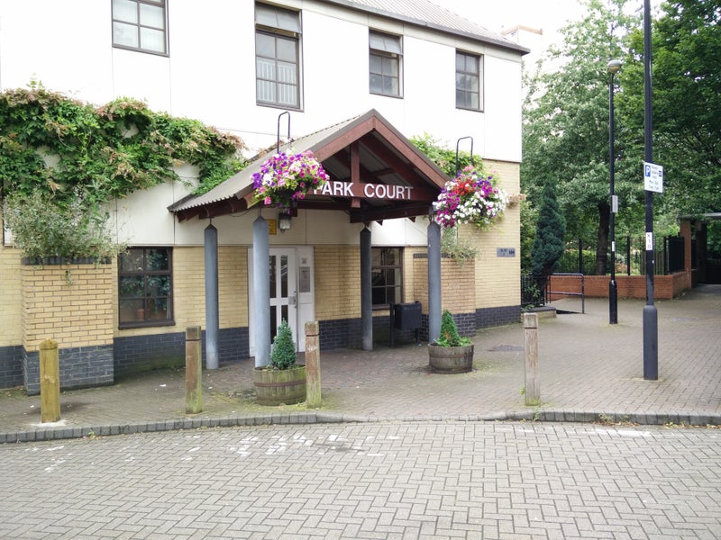 Photo 1: Building entrance