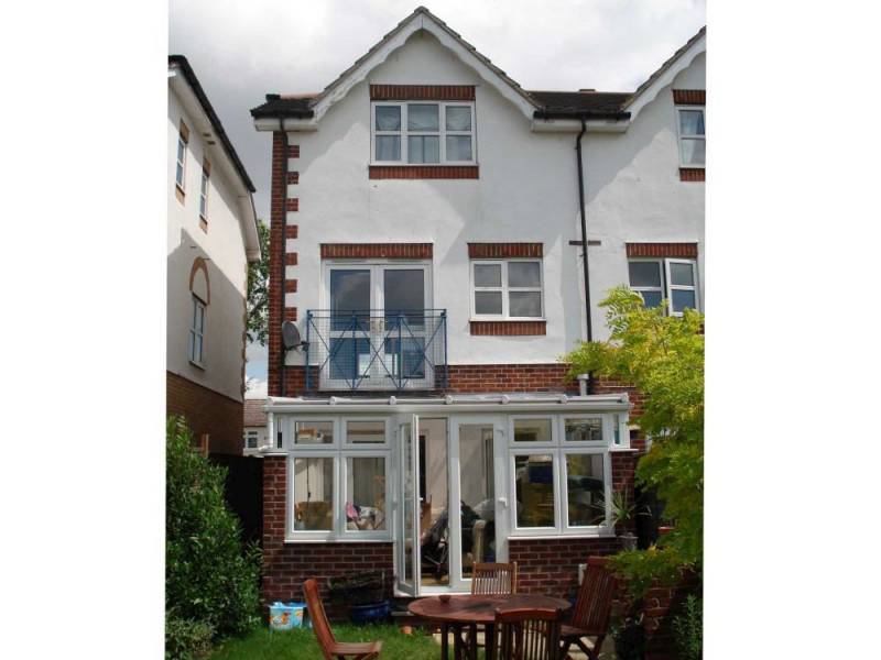 Photo 1: House from the rear garden 