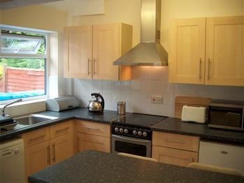 Photo 1: Modern kitchen with all appliances