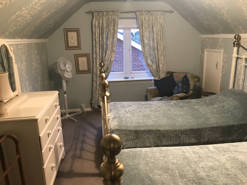 Photo 1: Double room in quiet area with off Street parking, 5 minutes walk from town, train &  bus. 