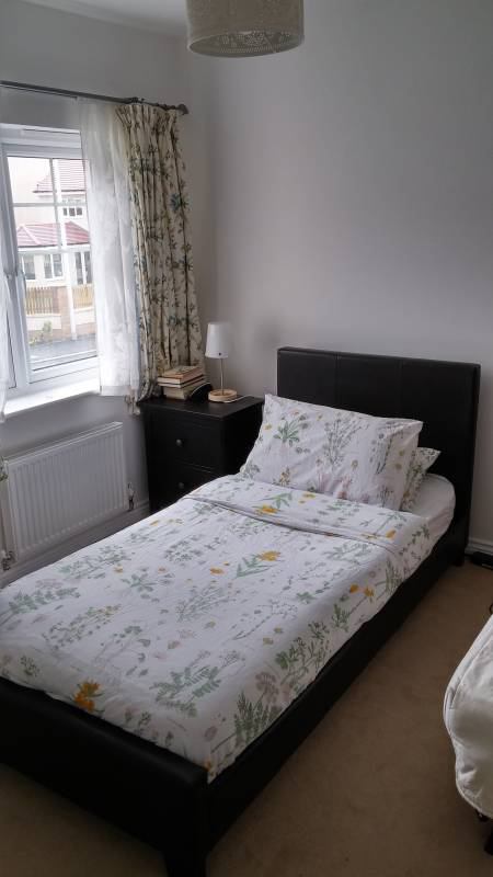 Photo 4: This picture needs updated. It's a small double bed now