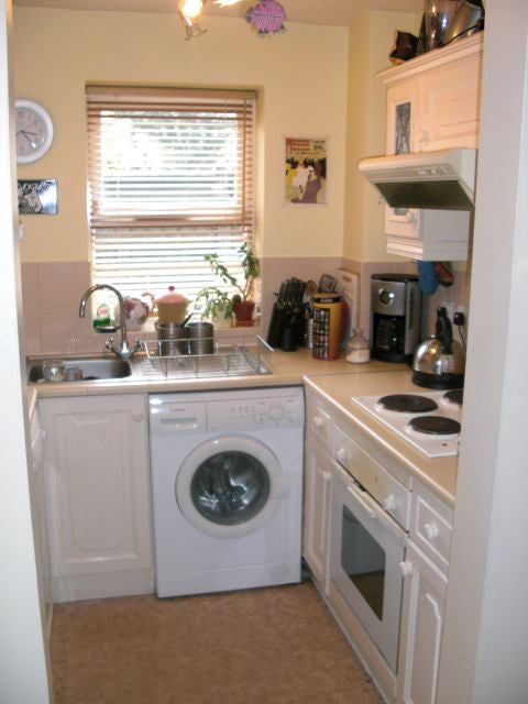 Photo 1: Compact Kitchen
