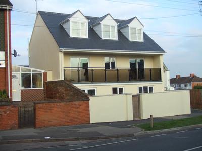 Photo 1: front of house