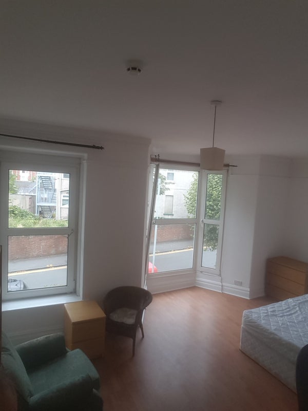 Photo 1: very large room with storage