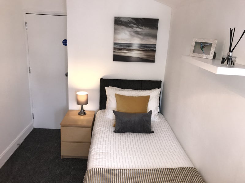 Photo 1: Large Single Bedroom, full fitted wardrobe and chest of drawers plus bedside table