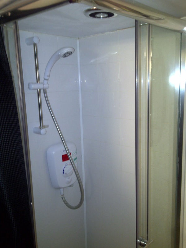 Photo 1: Shower and Own Kitchenette