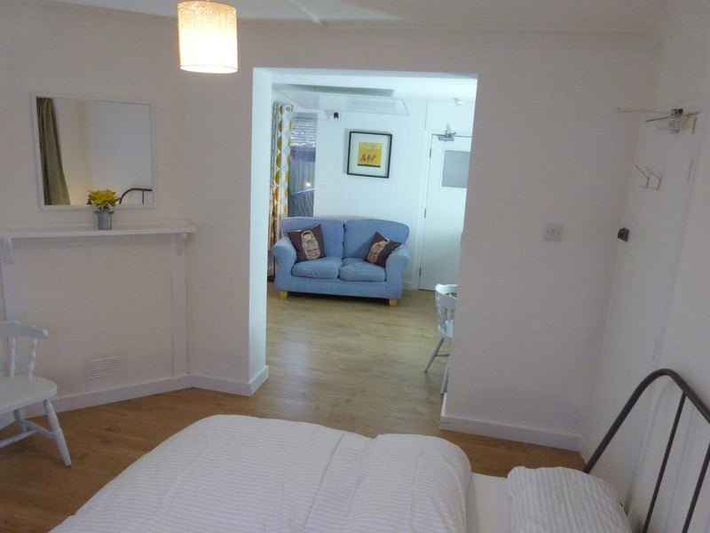 Photo 1: View through to living area