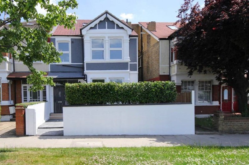 Photo 1: Front of property