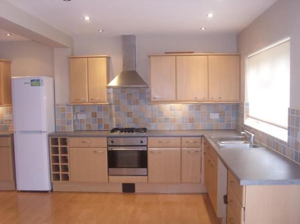 Photo 1: Kitchen