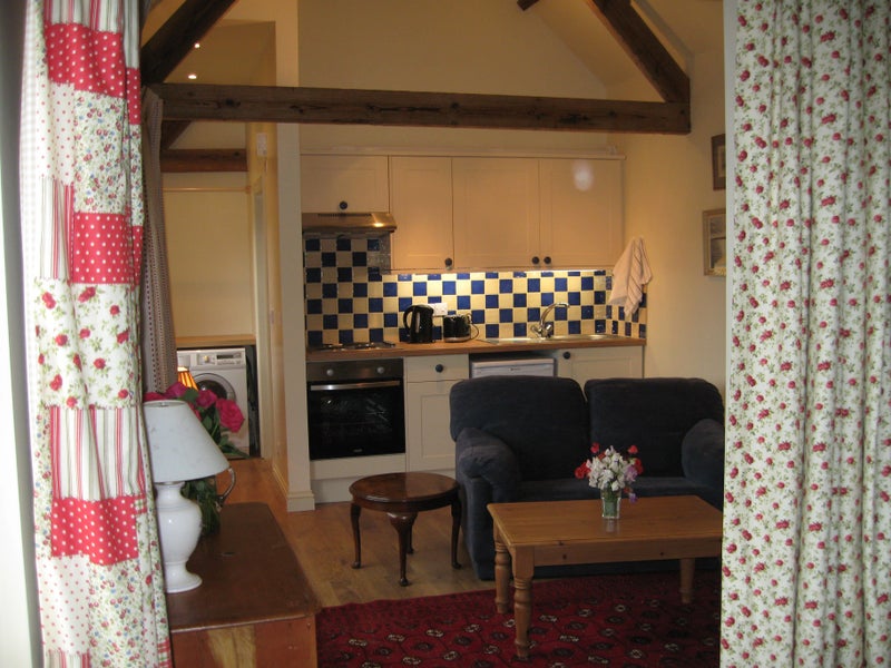 Photo 1: Kitchen end of the sitting room