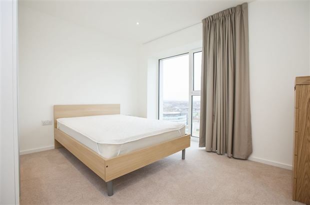 Photo 1: One of the bedrooms