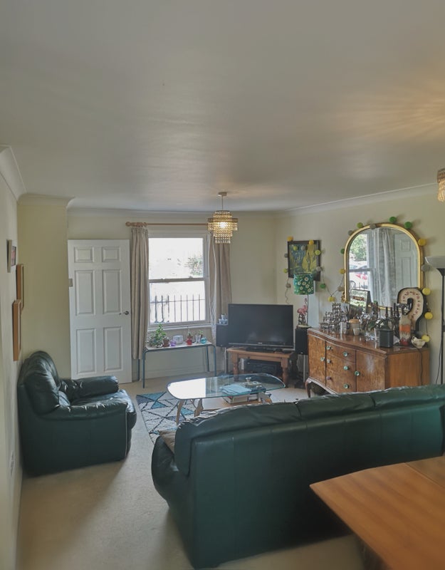 Photo 1: Large light airy through lounge