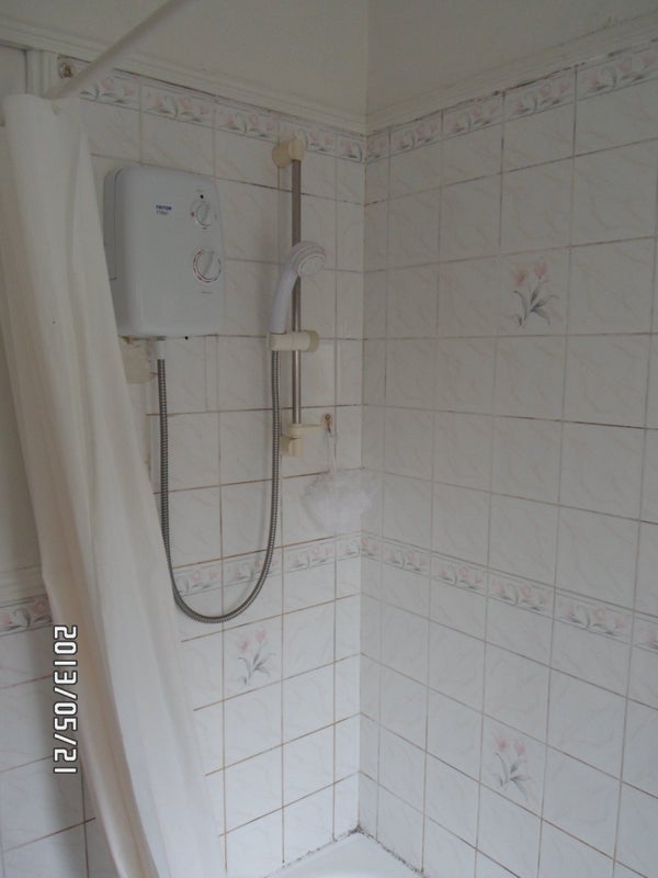 Photo 1: shower/bathroom