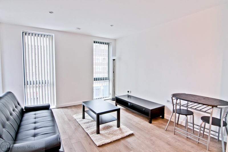 Photo 1: Lounge room