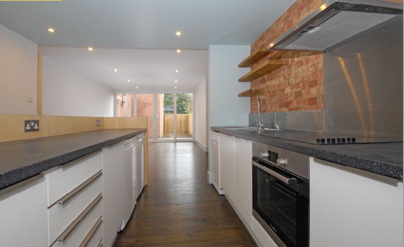 Photo 1: View from Kitchen to Living rm