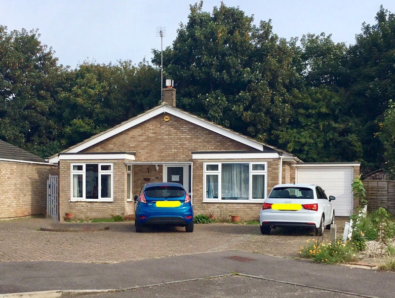 Photo 1: Large parking area