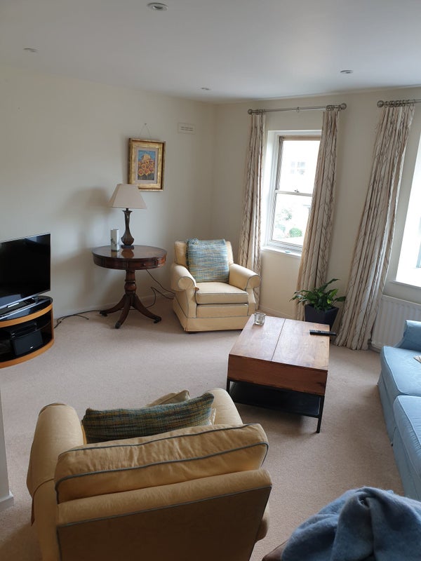 Photo 1: Lounge room - shared