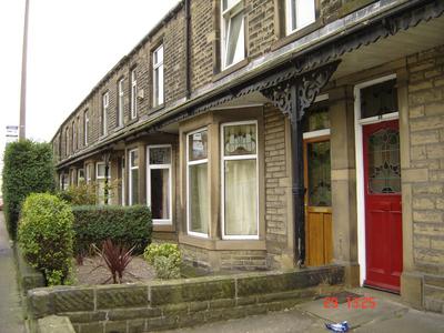 Photo 1: Brown Front Door