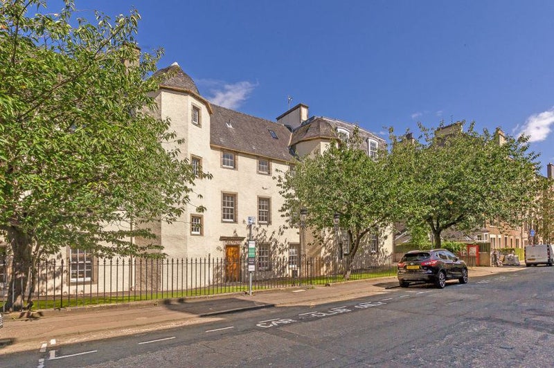 Photo 1: Entrance to the building