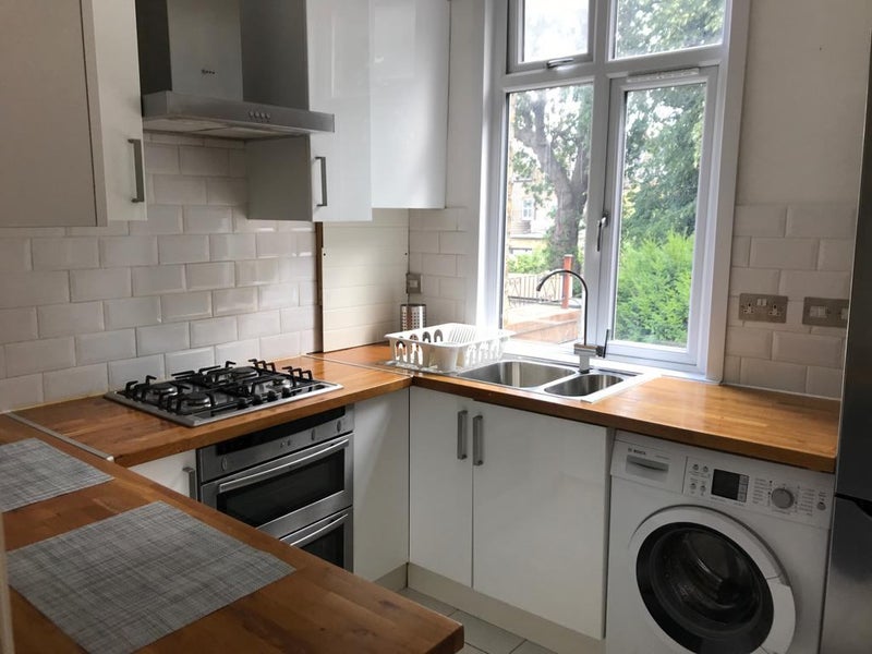 Photo 1: Kitchen - shared