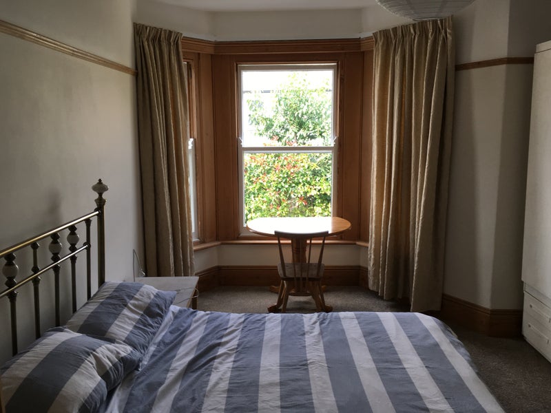 Photo 1: Bedroom  with large bay window