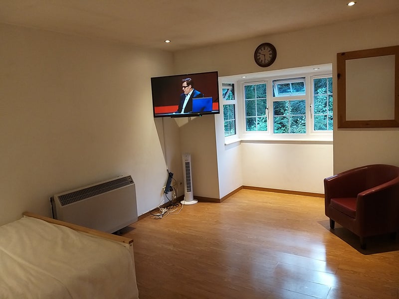 Photo 1: Living studio space