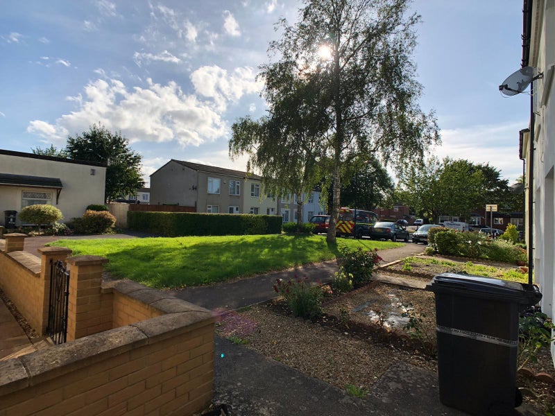 Photo 1: Front access and residents parking