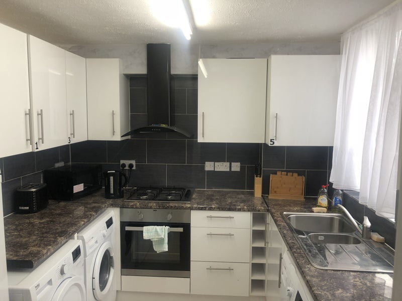 Photo 1: The Kitchen 