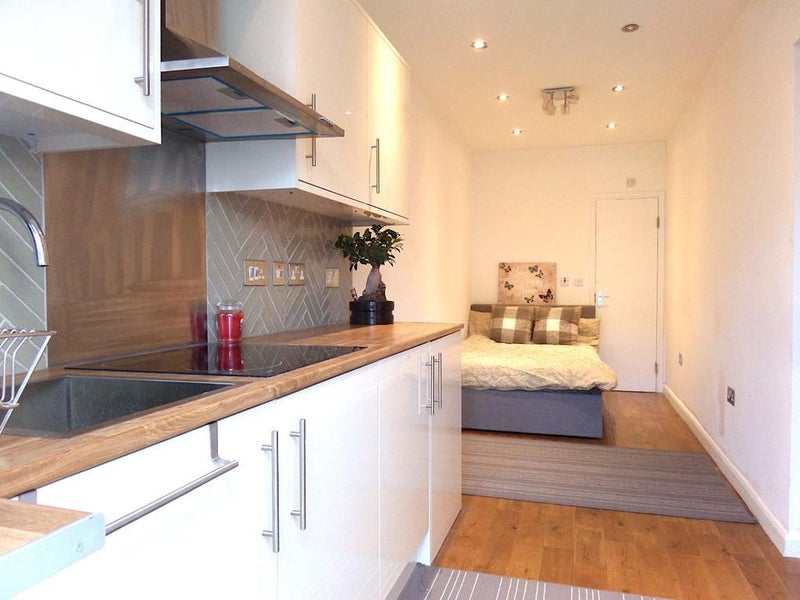 Photo 1: 1 BEDROOM STUDIO