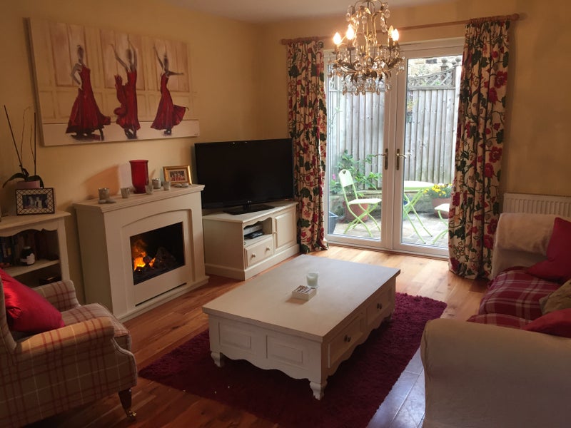 Photo 1: Shared living area 