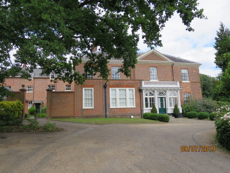 Photo 1: Main house and courtyard 