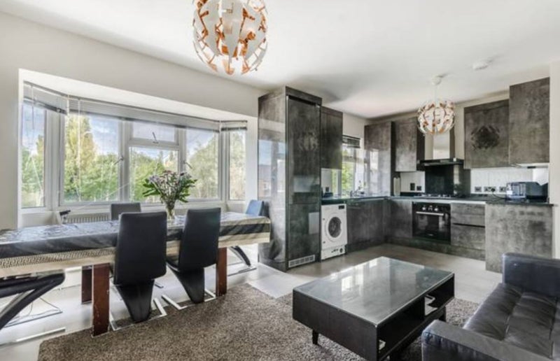 Photo 1: Open plan kitchen