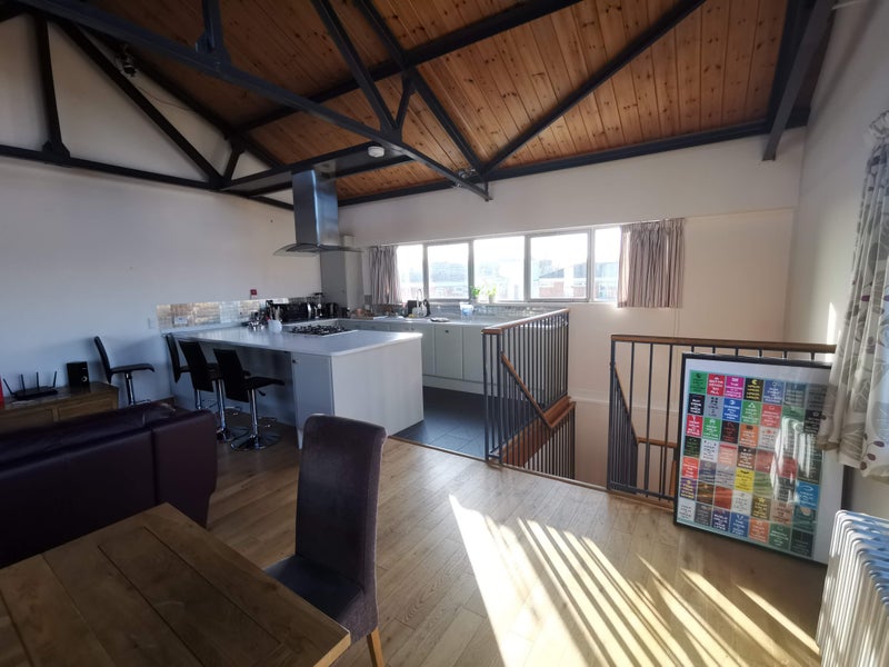 Photo 1: Open plan kitchen