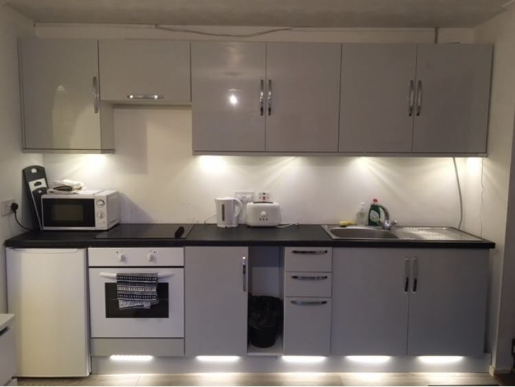 Photo 1: Kitchen with Oven, Hob, Fridge & Microwave