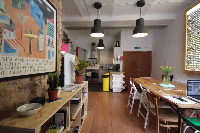 Photo 1: Kitchen and dining table