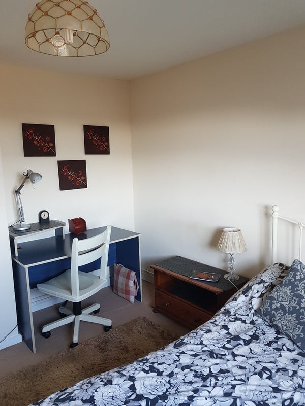 Photo 1: Study desk and bed