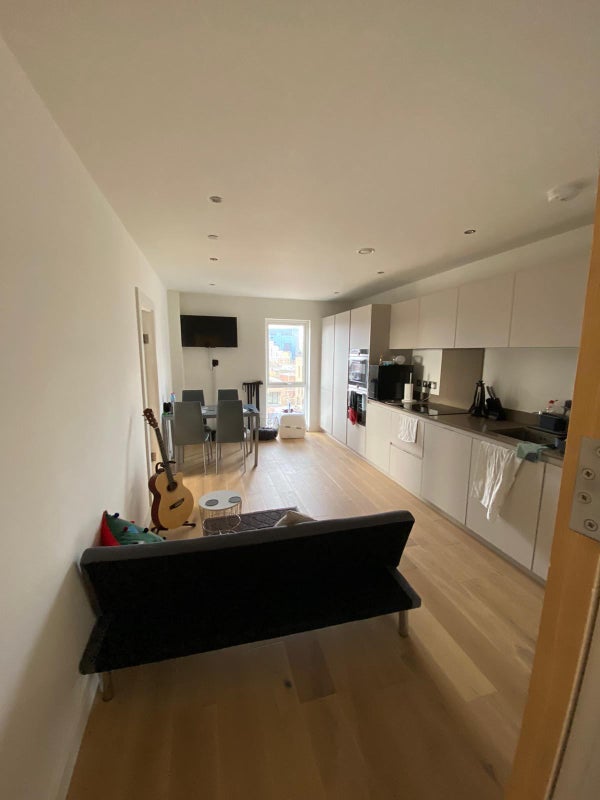 Photo 1: Living Room/Kitchen