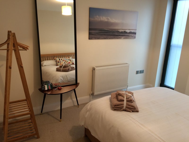 Photo 1: Bedroom (old airbnb picture - there is now a small wardrobe)