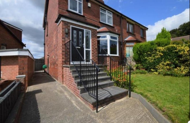 Photo 1: Front of house