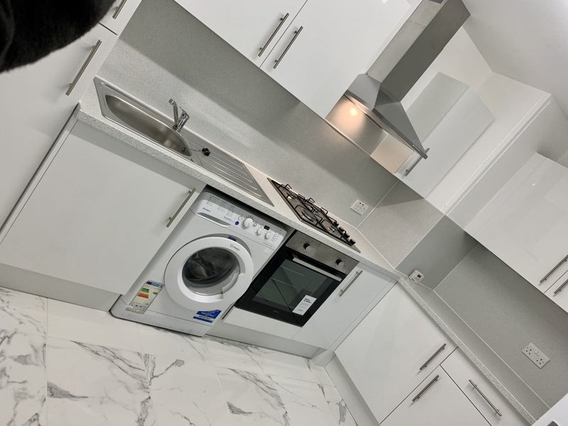 Photo 1: Brand new kitchen 