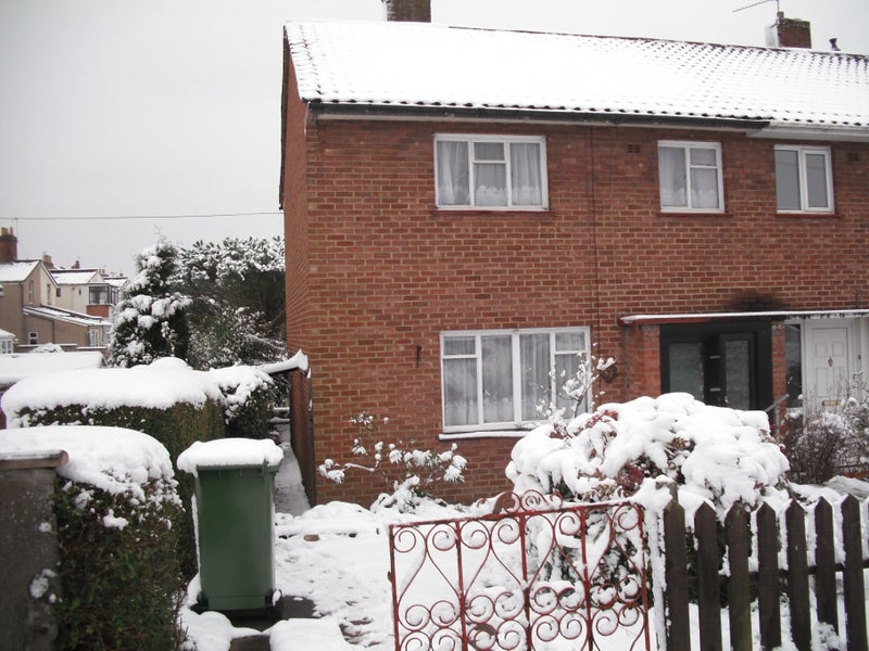 Photo 1: house in the snow