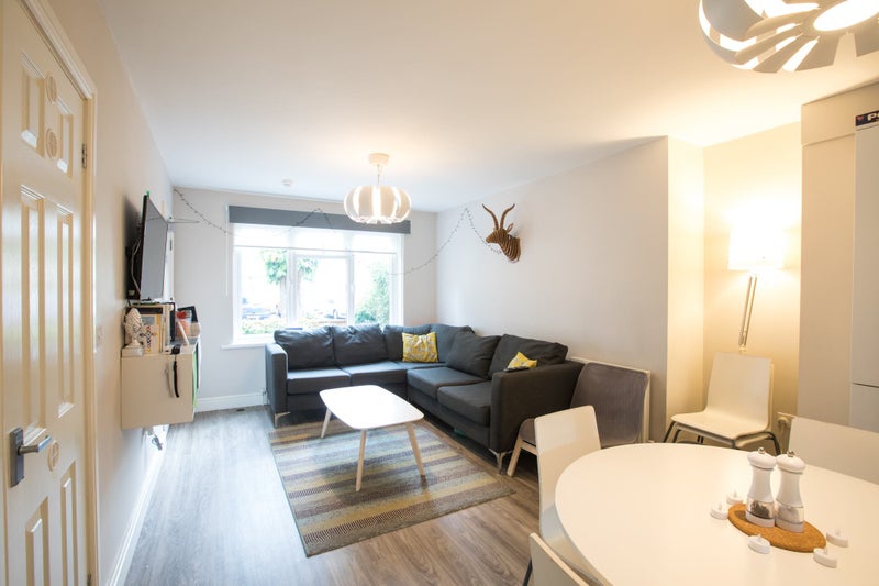 Photo 1: Smart TV , dining area and space to relax