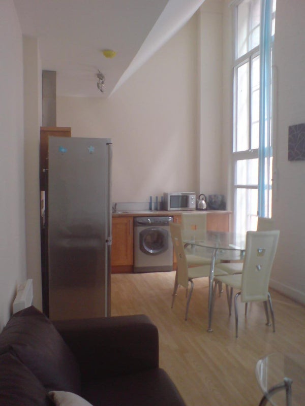 Photo 1: Lounge & Kitchen