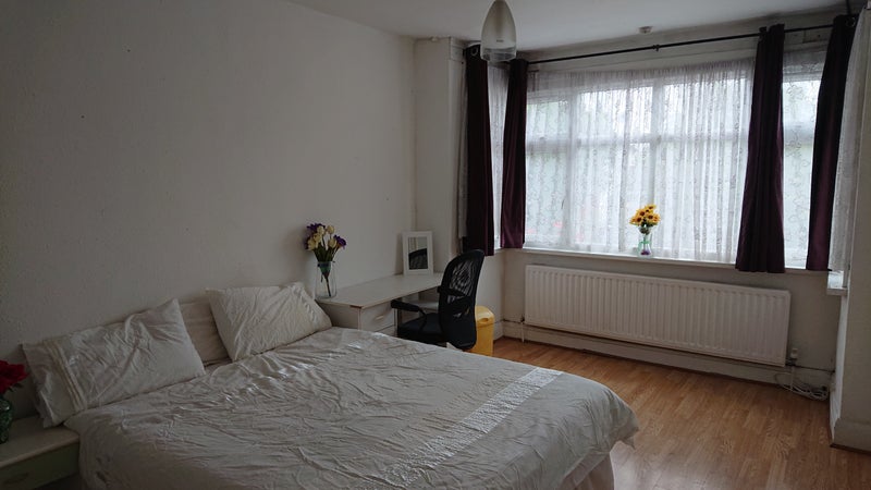 Photo 1: Room from back wall end