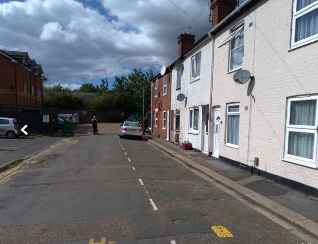 Photo 1: Parking outside house
